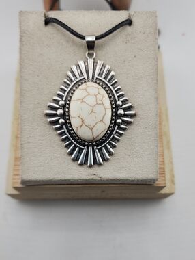 White Howlite Sunburst Pendant Necklace with Black Cord